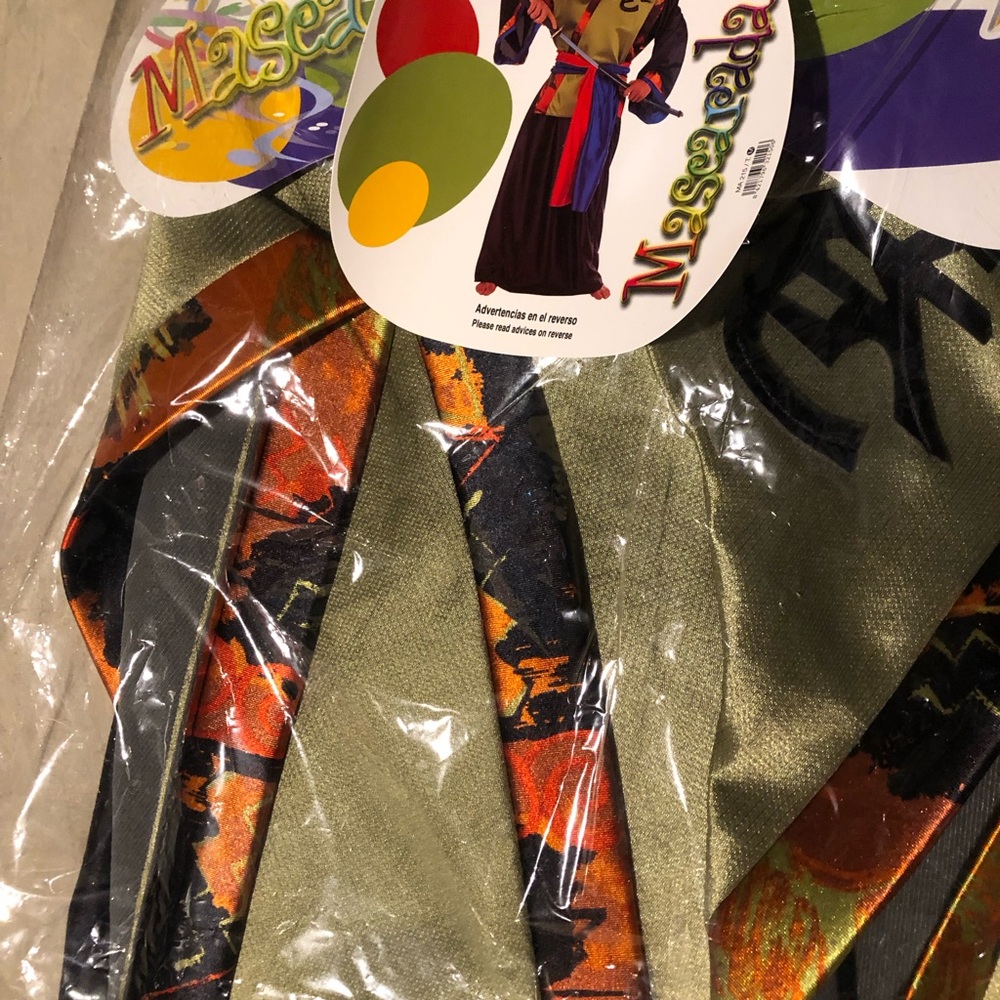 Masquerade :  Geisha Costume Green with black and orange trim.